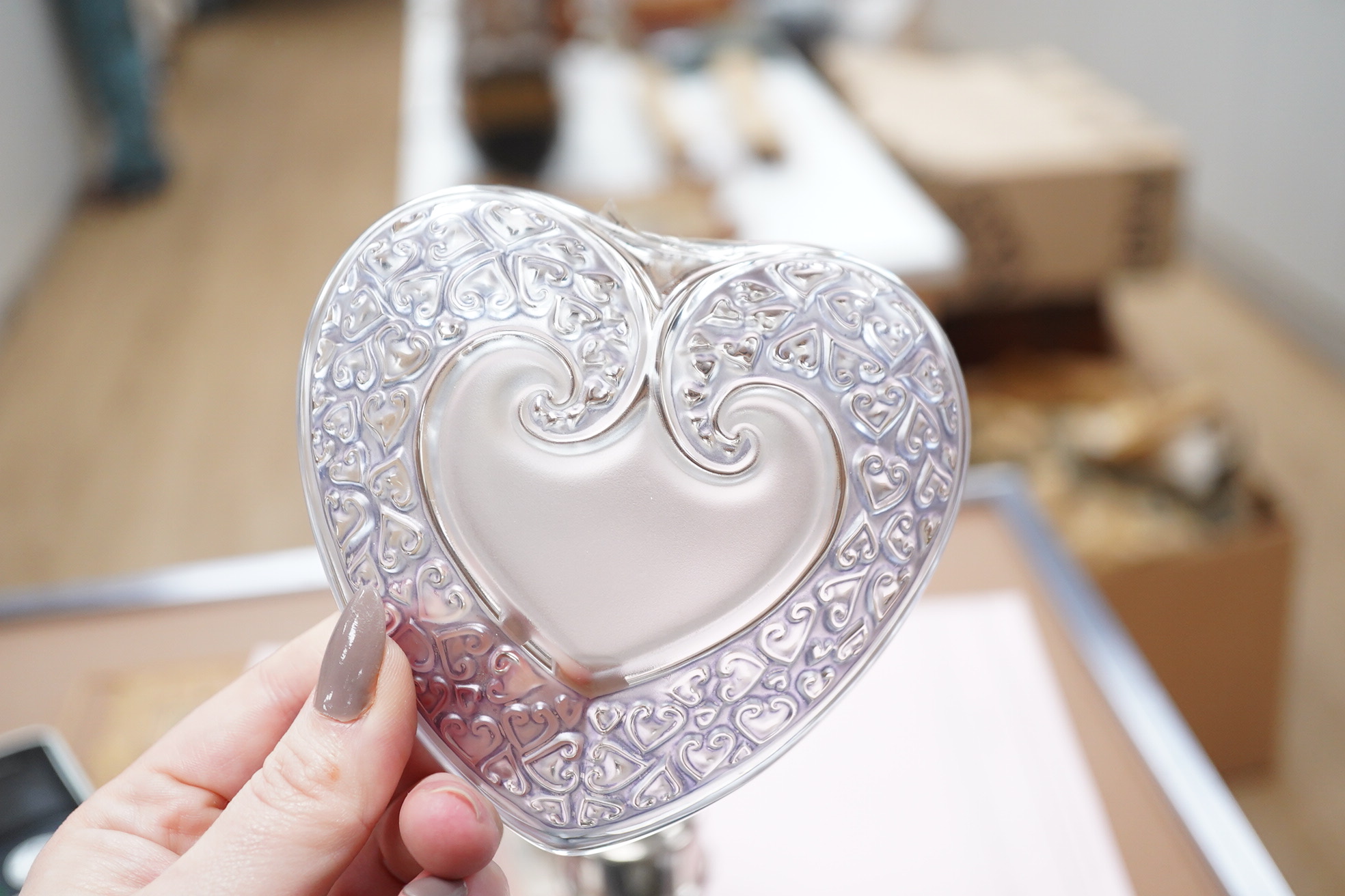 Two modern Lalique glass pin dishes in the form of hearts, largest 11cm wide. Condition - good